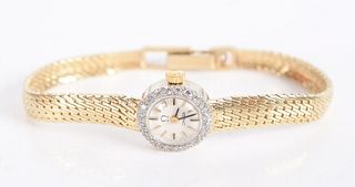 A Ladies 14k Gold Omega Wristwatch