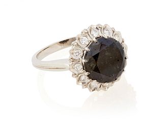 A black diamond and diamond ring