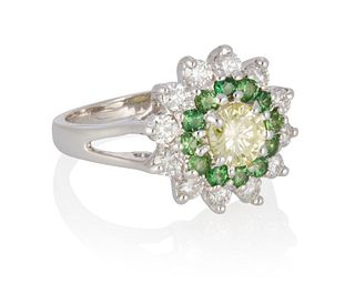 A fancy green-yellow diamond and tsavorite garnet ring