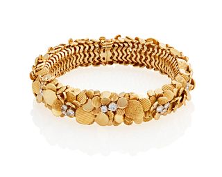 A gold and diamond bracelet