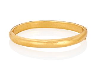 A high karat gold bangle bracelet