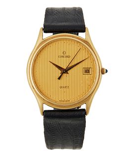 A Concord Mariner gold wristwatch