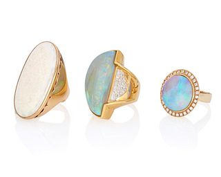 Three opal rings