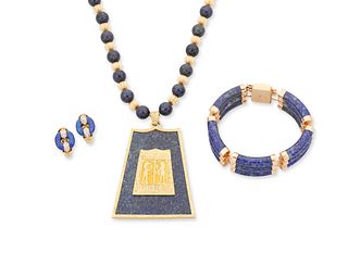 A group of gold and lapis lazuli jewelry