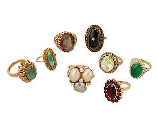 Eight gem-set rings