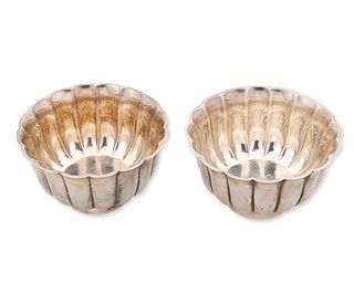 A pair of Bulgari sterling silver and vermeil scalloped bowls