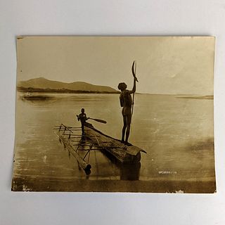 Aborigines Fishing from Dugout Canoe