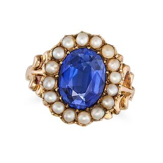 A SYNTHETIC SAPPHIRE AND SEED PEARL CLUSTER RING in yellow gold, set with an oval cut synthetic s...