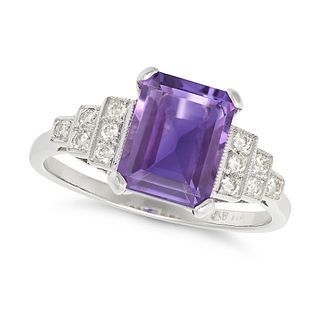 AN AMETHYST AND DIAMOND DRESS RING in platinum, set with an octagonal step cut amethyst of approx...