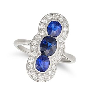 A SAPPHIRE AND DIAMOND DRESS RING in platinum, set with three oval cut sapphires in a border of s...