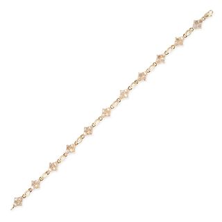 A MOONSTONE BRACELET in 10ct yellow gold, comprising a row of alternating quatrefoil links set wi...