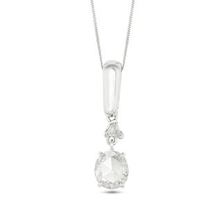 A DIAMOND PENDANT NECKLACE in white gold, the pendant set with a trillion cut diamond suspending ...