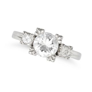 A DIAMOND THREE STONE RING in platinum, set a round brilliant cut diamond to the centre of approx...
