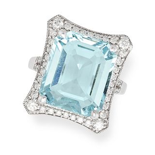 AN AQUAMARINE AND DIAMOND DRESS RING in 18ct white gold, set with an octagonal step cut aquamarin...