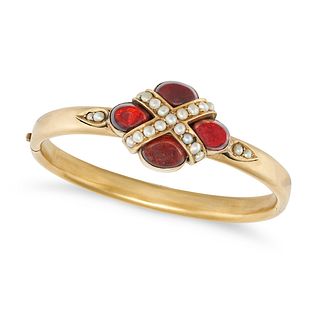 AN ANTIQUE GARNET AND PEARL BANGLE the hinged bangle set with four oval cabochon garnets accented...
