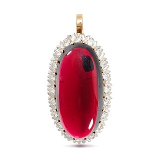 A GARNET AND DIAMOND PENDANT in 18ct yellow gold, set with an oval cabochon garnet in a cluster o...