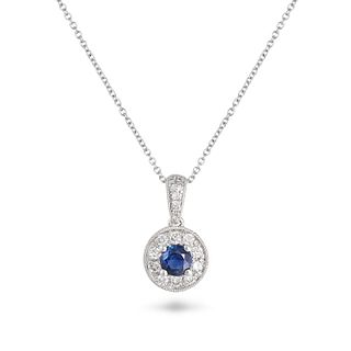 A SAPPHIRE AND DIAMOND CLUSTER PENDANT NECKLACE in 18ct white gold, set with a round cut sapphire...