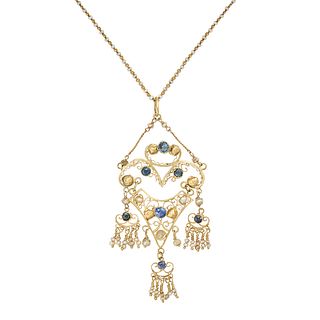 AN ANTIQUE FRENCH PEARL AND SAPPHIRE PENDANT NECKLACE in 18ct yellow gold, the openwork pendant s...