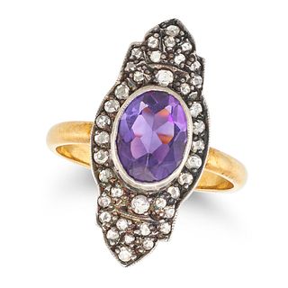 AN AMETHYST AND DIAMOND DRESS RING in yellow gold and silver, the elongated face set with an oval...