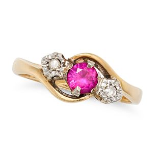 A RUBY AND DIAMOND TWISTED THREE STONE RING in 18ct yellow gold, comprising a central round cut r...