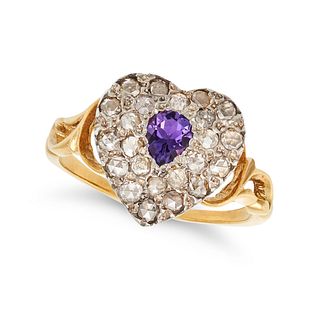 AN AMETHYST AND DIAMOND HEART RING designed as a heart set with a pear cut amethyst and single cu...