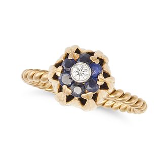 A SAPPHIRE AND DIAMOND BUD RING in 18ct yellow and white gold, set with a round brilliant cut dia...
