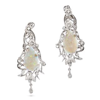 A PAIR OF VINTAGE OPAL AND DIAMOND DROP EARRINGS in 14ct white gold, each set with a pear shaped ...