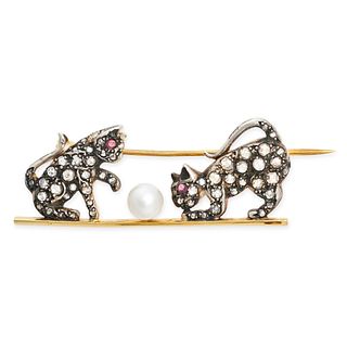 A DIAMOND, RUBY AND PEARL KITTEN BROOCH designed as two kittens playing with a ball, the kittens ...