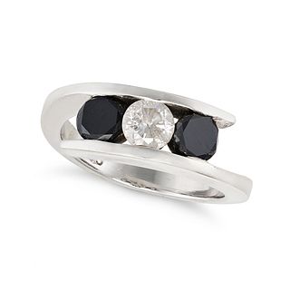 A THREE STONE BLACK AND WHITE DIAMOND CROSSOVER RING in 14ct white gold, set with round brilliant...