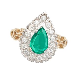 AN EMERALD DOUBLET AND DIAMOND RING in 9ct white and yellow gold, set with a pear shaped emerald ...