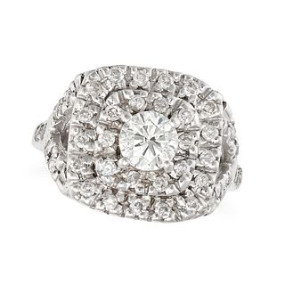 A DIAMOND CLUSTER RING in 14ct white gold, set with a principal round brilliant cut diamond of ap...
