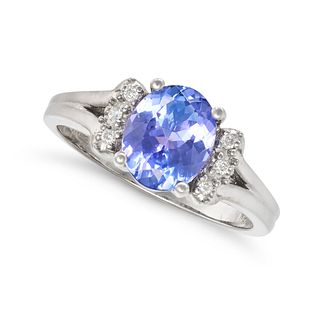 A TANZANITE AND DIAMOND RING in 18ct white gold, set with an oval cut tanzanite of approximately ...