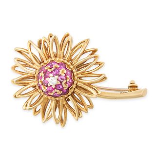 KUTCHINSKY, A VINTAGE RUBY AND DIAMOND BROOCH BROOCH in 18ct yellow gold, designed as a stylised ...