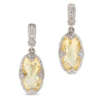 A PAIR OF CUBIC ZIRCONIA DROP EARRINGS in 18ct white gold and silver, each comprising a row of ro...