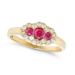 A RUBY AND DIAMOND CLUSTER RING in 18ct yellow gold, set with three oval and round cut rubies in ...