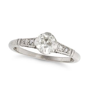 A SOLITAIRE DIAMOND RING in 18ct white gold and platinum, comprising a round cut diamond accented...