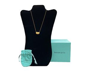 Tiffany & Co., Elsa Peretti Bean Design Pendant with 16” 18 kt Gold Chain
