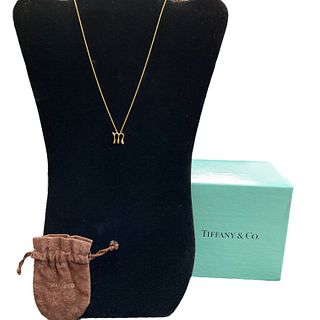 Tiffany & Co., Elsa Peretti "M" Alphabet Pendant & Chain Necklace in 18 kt Yellow Gold