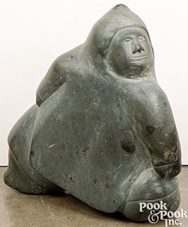 Large Eskimo carved stone figure of a man