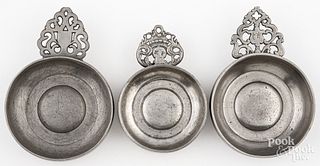 Three American pewter porringers, 19th c.