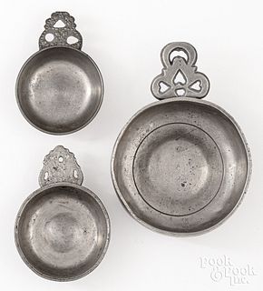 Three New England pewter porringers, 19th c.