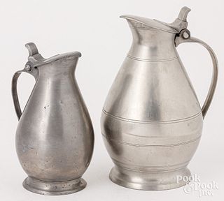 Two French pewter penguin form measures, 19th c.