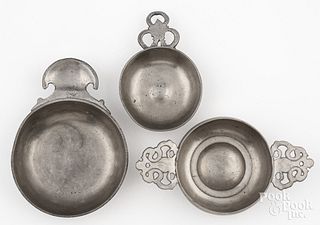 Three pewter porringers, 18th c.