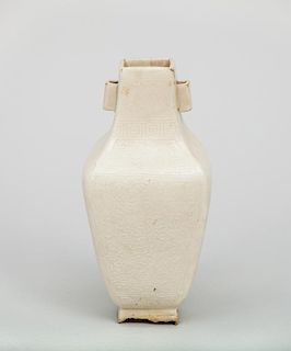 Chinese Relief-Decorated White Glazed Pottery Baluster-Form Vase