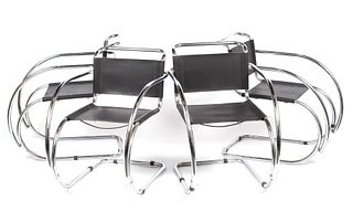FOUR CHROME ARMCHAIRS IN THE MANNER OF MIES VAN DER ROHE