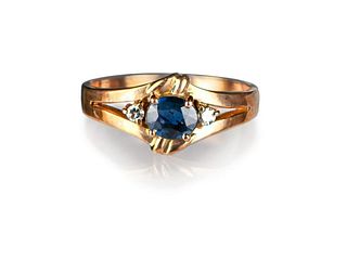 Natural blue sapphire and diamond 18K ring