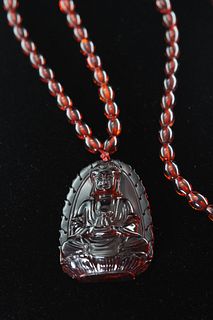 Natural red amber Guanyin necklace