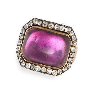 AN ANTIQUE AMETHYST AND DIAMOND RING in rose gold and silver, set with a foiled cabochon cut amet...