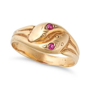 AN ANTIQUE RUBY SNAKE RING in 14ct yellow gold, designed as two coiled snakes, each head set with...