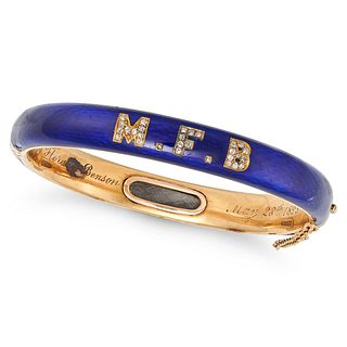AN ANTIQUE VICTORIAN ENAMEL AND DIAMOND BANGLE in yellow gold, the hinged body decorated with blu...